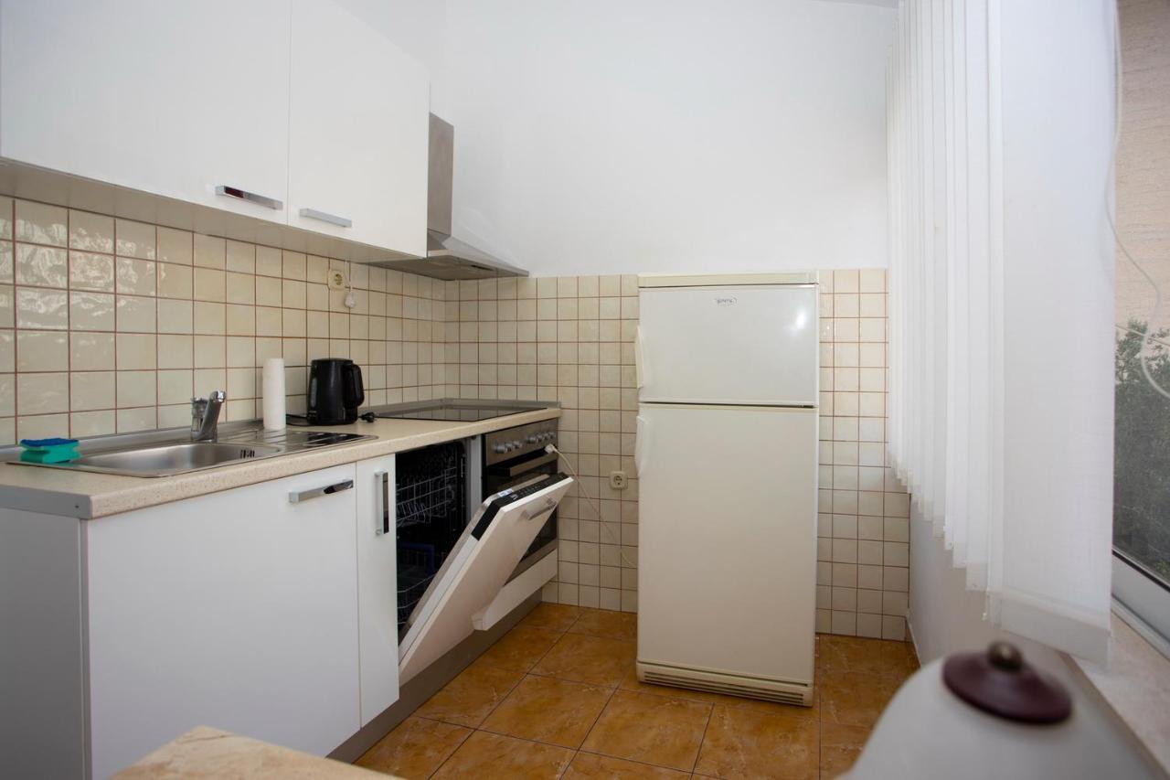 Apartmani Miki พอดโกรา ภายนอก รูปภาพ