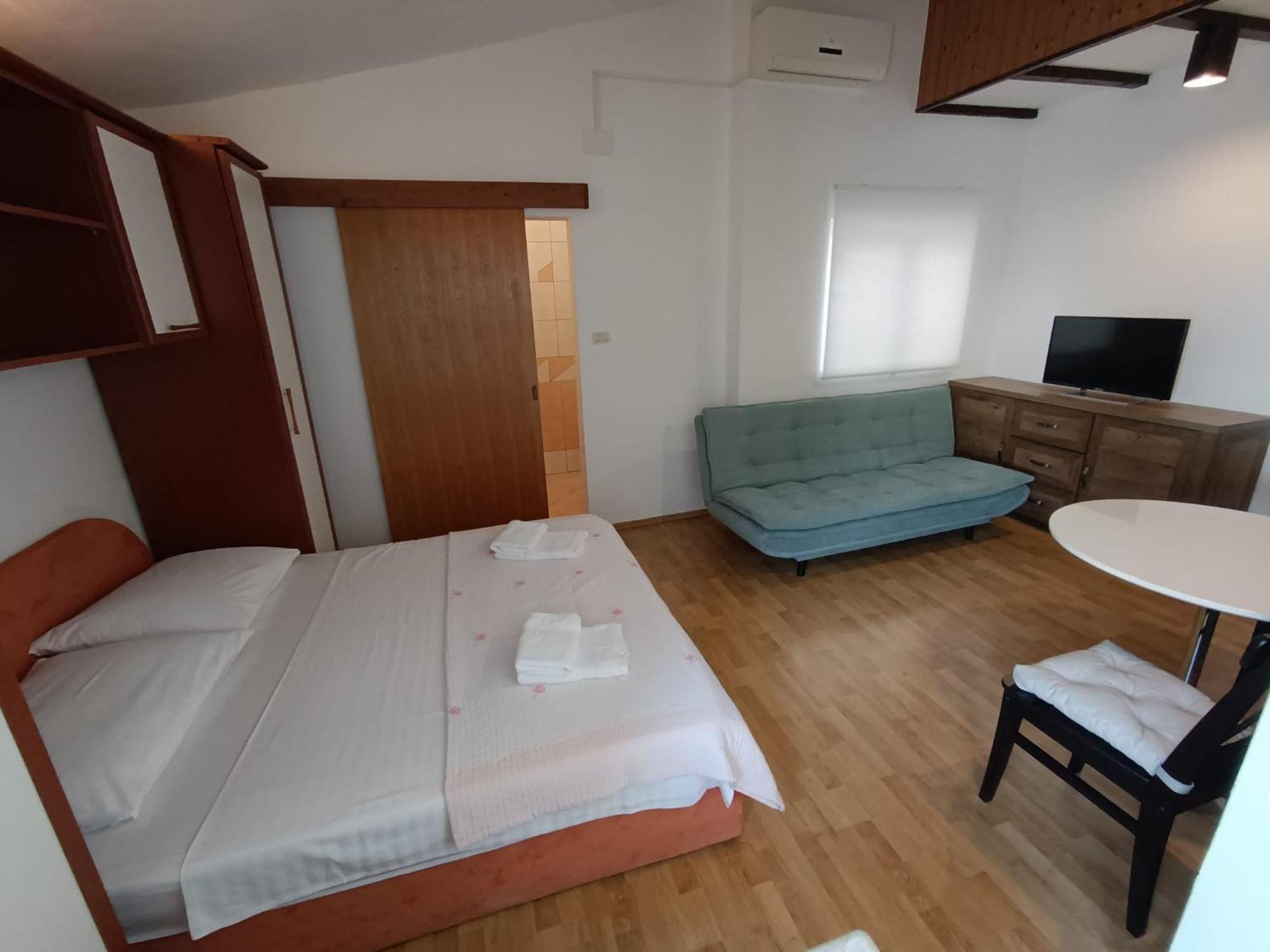 Apartmani Miki พอดโกรา ภายนอก รูปภาพ